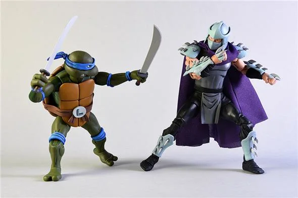 NECA - TMNT CARTOON LEONARDO VS SHREDDER 2PK