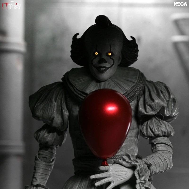 IT WELCOME TO DERRY PENNYWISE BLACK AND WHITE ULTIMATE ACTION FIGURE